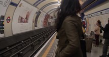 4K Metro System Slider Shot Slow Motion Embankment Station People Waiting Public Transit London