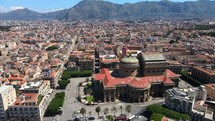 Aerial shot drone orbits to the left around Teatro Massimo in Palermo, Sicily, Italy