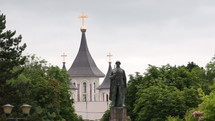 Soldier Statue In Front Of Ornate Orthodox Church