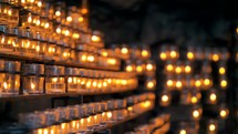 Hundreds of votive candles set up for a prayer vigil.