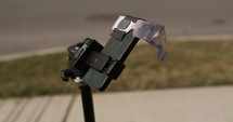 Cell phone with Solar glasses tapped to view Eclipse