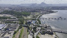 Drone orbits to the left over two bridges crossing the Vitória Bay in Espirito Santo