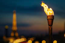 AI Generated Image. Burning and flaming sport torch symbolizing the opening of international sport competition