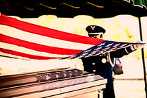 Soldiers begin flag presentation ceremony as they stand at attention and begin to fold the flag at veteran's graveside ceremony. "On behalf of the President of the United States, (the United States Army; the United States Marine Corps; the United States Navy; or the United States Air Force), and a grateful Nation, please accept this flag as a symbol of our appreciation for your loved one's honorable and faithful service."