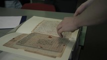 Man Working In Usa Archives sorting handwritten Letters And Historic Document
