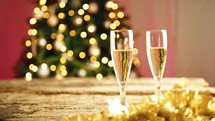 Champagne sparkling into the glasses for new year