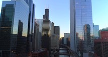 Aerial Chicago Illinois Cinematic Conclusion Shot Pull Back Train Skyscrapers Urban City Drone