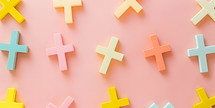 Colorful Crosses on a  graphic background with copy space 