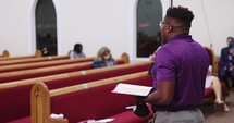 African American Man in Church Speaking Mid Side