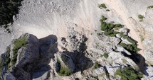 Top View Of Sandstone And Limestone Formation Of Hasmasul Mare Mountain In Harghita County, Romania On A Sunny Day. aerial drone