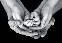 hands of a family 