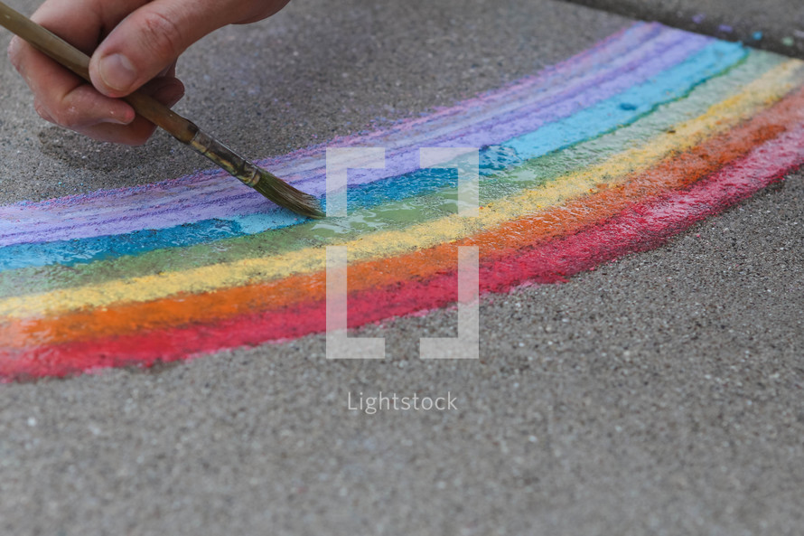 painting a rainbow with chalk 