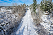 snow over train tracks 