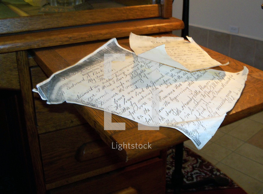 A hand written letter like the letters that Paul wrote to the churches in the New Testament or a personal letter or manuscript hand written in cursive writing.