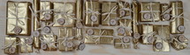 advent calendar ribbon with twenty four golden presents on natural wood