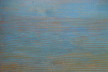 wooden table with cyan paint