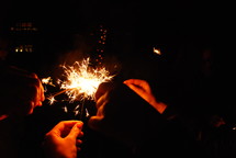 Celebrating New Years with sparklers.