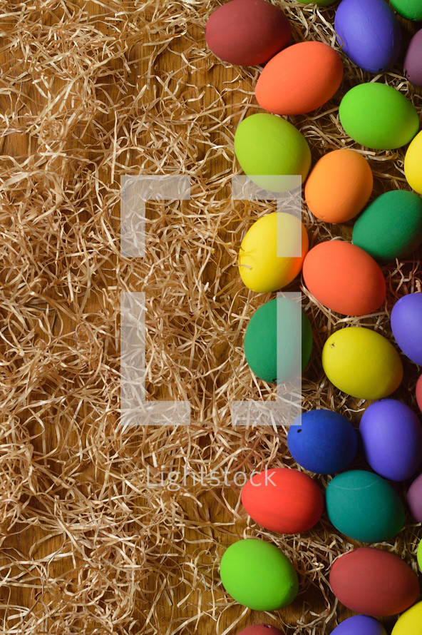 dyed Easter eggs on straw 
