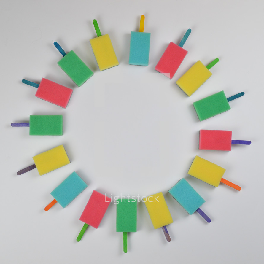 colorful sponge popsicle circle on white background as thank you for the volunteer cleaning team in church or as decoration for the vacation bible school in the classroom