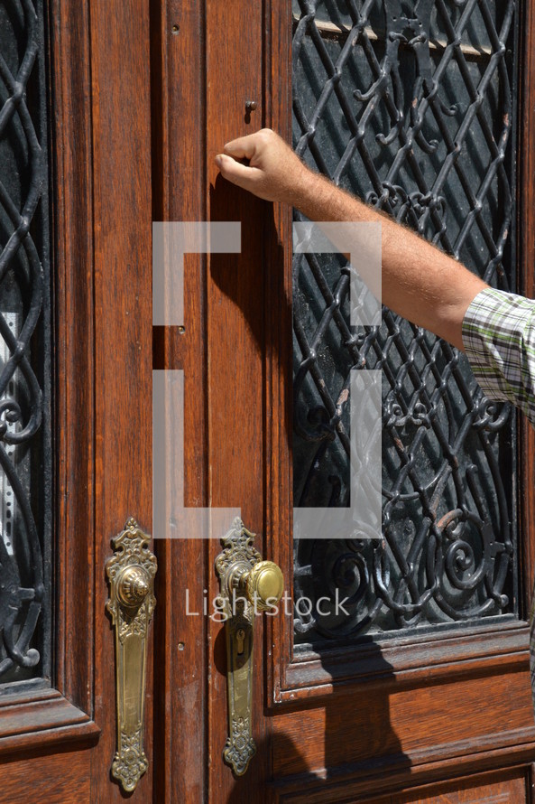 Someone Knocking At An Old Door Door Photo Lightstock