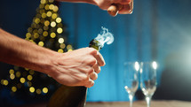 champagne bottle opening for New Year's Eve celebration