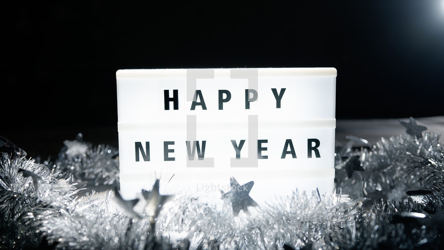Light board with happy new year sign