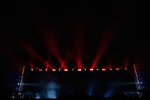 spotlights over a dark stage 
