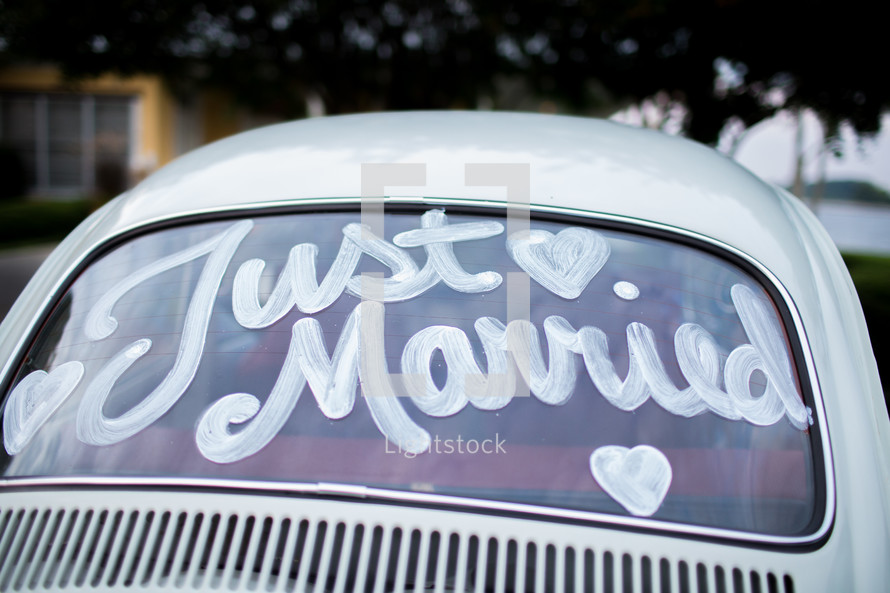 Just Married on a car window 