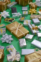 collection of wrapped Christmas gifts 