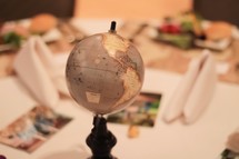 globe on a set table 
