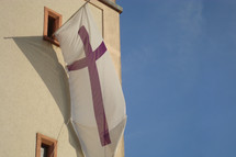 flag with purple cross on it

