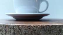 coffee cup and saucer on a table 