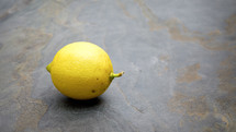 lemon on gray slate 