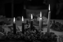candles on a Christmas centerpiece 