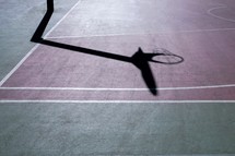 street basket hoop shadows on the court, sports equipment