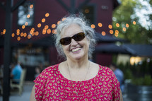 smiling woman in sunglasses 