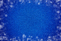 bokeh dots on blue Glitter Background