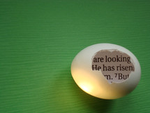 eggshell with a piece of the bible inside saying: HE HAS RISEN!, 
