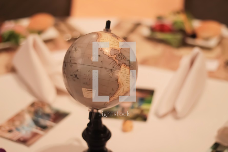 globe on a set table 