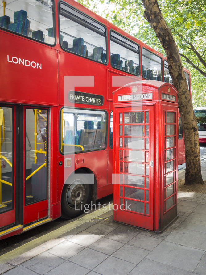 red double decker bus and phone booth in London