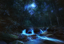 flowing river and cascading waterfall under moonlight 