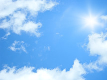 sunburst in a blue sky 