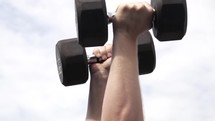 man lifting weights 