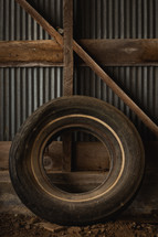 Vintage tire in a barn