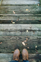 boots standing on a deck 