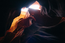 sunlight shining into a cave 