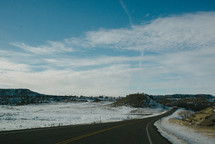 road and snowy landscape 