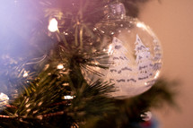 clear ornament on a Christmas tree