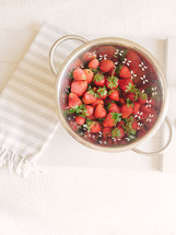 a bowl of strawberries 