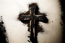 Cross covered in dirt and ashes